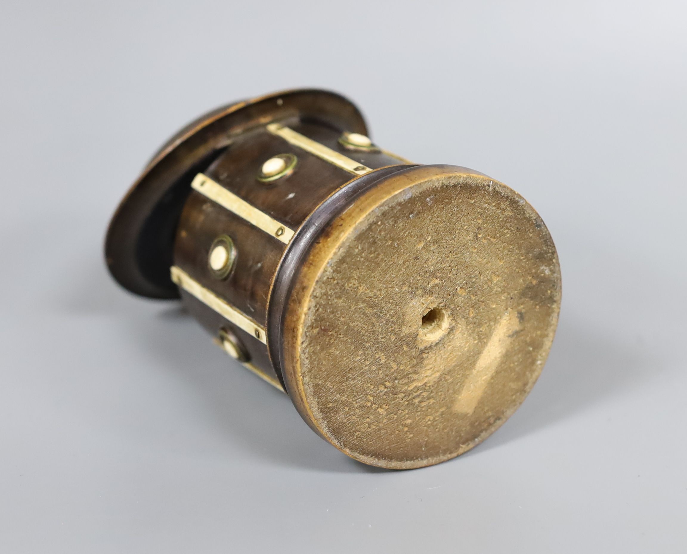 A 19th century ebonised walnut money bank, 9.5cm